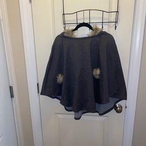 Women’s sweatshirt poncho with faux fur hood